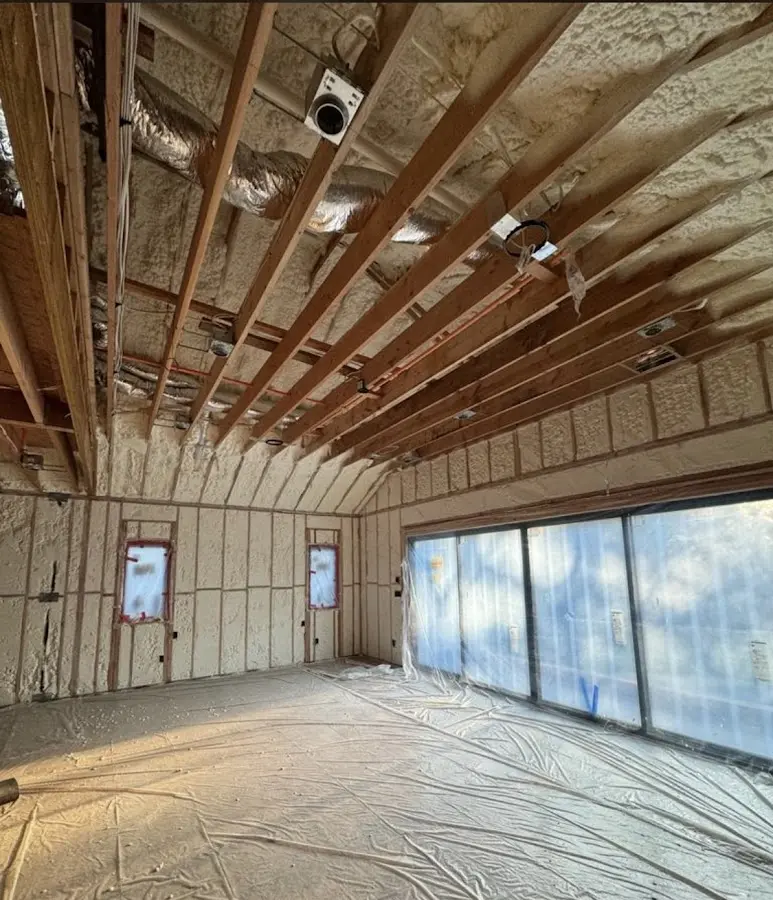 Interior walls and ceiling insulated with spray foam during new construction in Red Oak